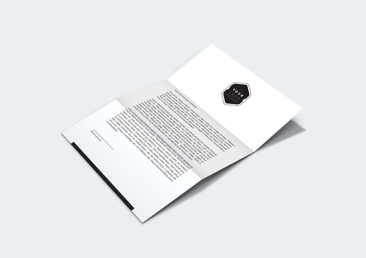 Designförslag till logotyp på ett pappersark.