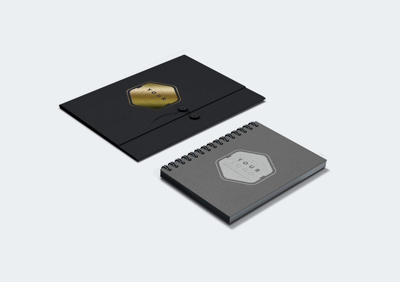 Designförslag till logotyp på anteckningsblock och pärm.